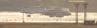 Plane Crash in DC after Collision with Helicopter - LIVE Breaking News Coverage (Potomac River) by Agenda-Free TV. Public domain, via Wikimedia Commons