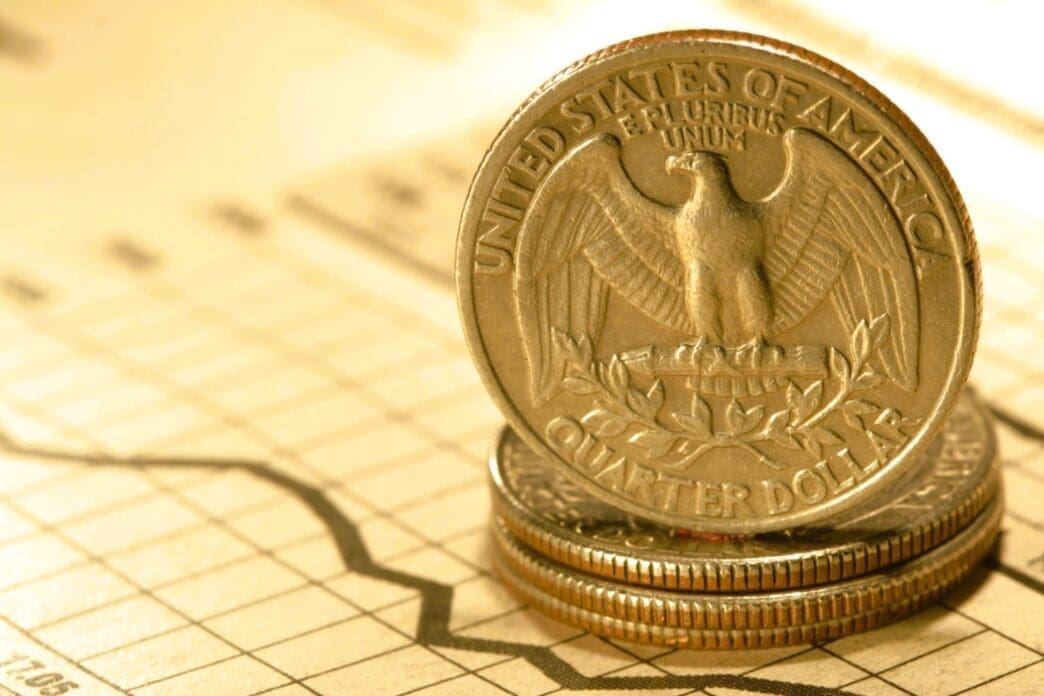 Quarter dollar depicted in a chart illustrating the concept of inflation