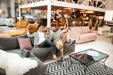 The U.S. imports a variety of goods from China, including bedding, mattresses, and furniture. Meanwhile, a delightful adult couple is happily exploring and enjoying their time in a furniture store