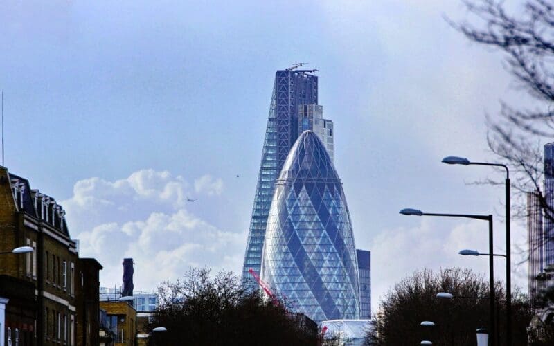 View of London buildings from a low angle, set against the sky