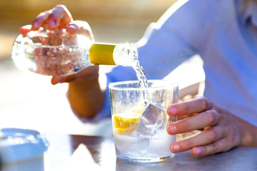 Young entrepreneur enjoying a soda on a restaurant terrace