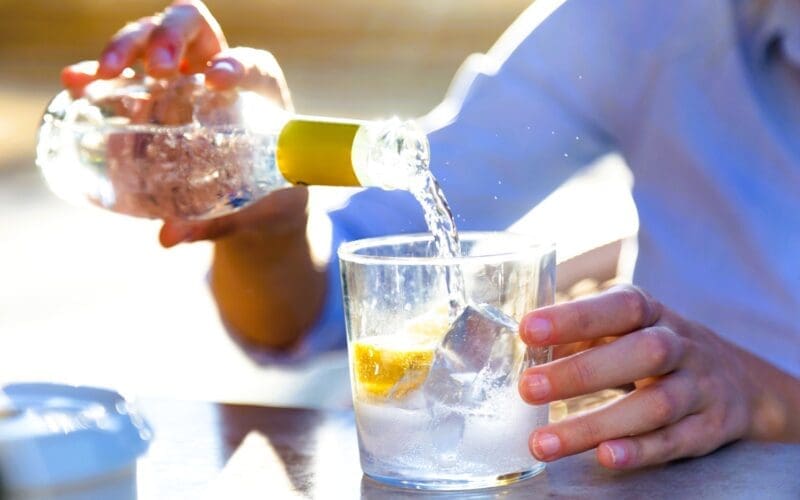 Young entrepreneur enjoying a soda on a restaurant terrace