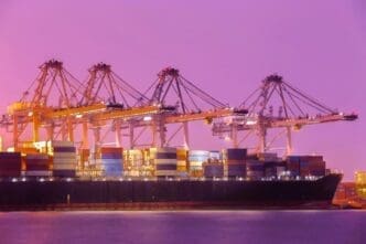Cargo freight ship at the harbor for logistics and import-export operations