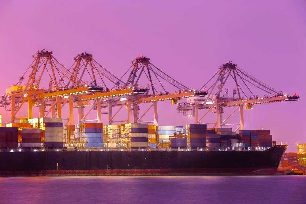 Cargo freight ship at the harbor for logistics and import-export operations