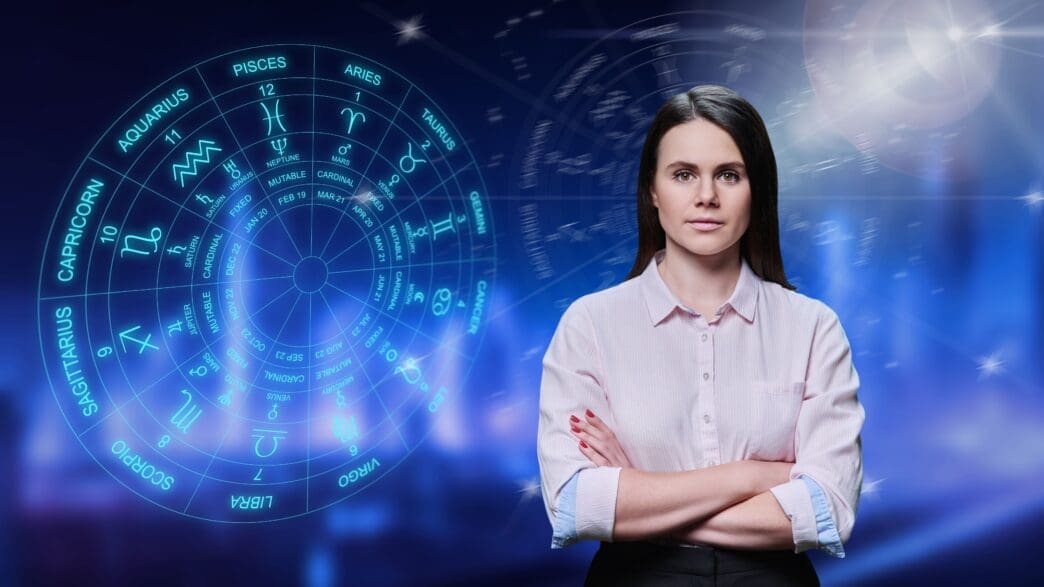 Portrait of young woman, on background with astrological symbols