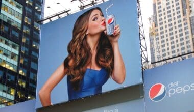 A billboard showing a young attractive woman on a Pepsi advertisement