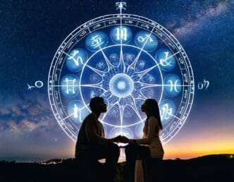 A couple discovers love beneath a starry sky, with the zodiac wheel representing their fate
