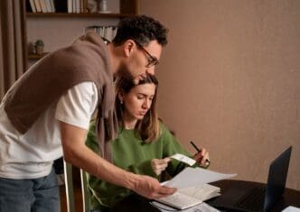 A couple feeling stressed about their financial challenges and tax obligations