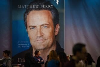 A large banner of Matthew Perry book Friends, Lovers, and the Big Terrible Thing A Memoir at Gaudeamus book fair