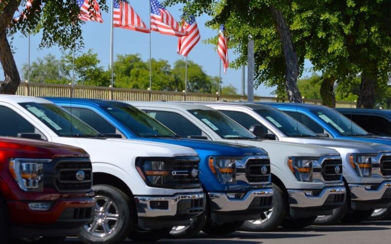 A row of new Ford F-150 trucks for sale at a Phoenix area new car dealership