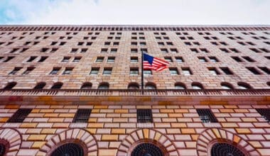 A street-level perspective of the Federal Reserve Bank of New York building, located in the Financial District of Lower Manhattan, New York City