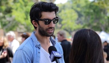 Actor Justin Baldoni talks to a reporter at the “Rocket’s Universe” grand opening, which is the 64th universally accessible playground built by Shane’s Inspiration