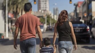 An immigrant family exploring a new city, showcasing the challenges and aspirations of those striving for a better life