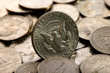 Arrangement of scattered dollar coins