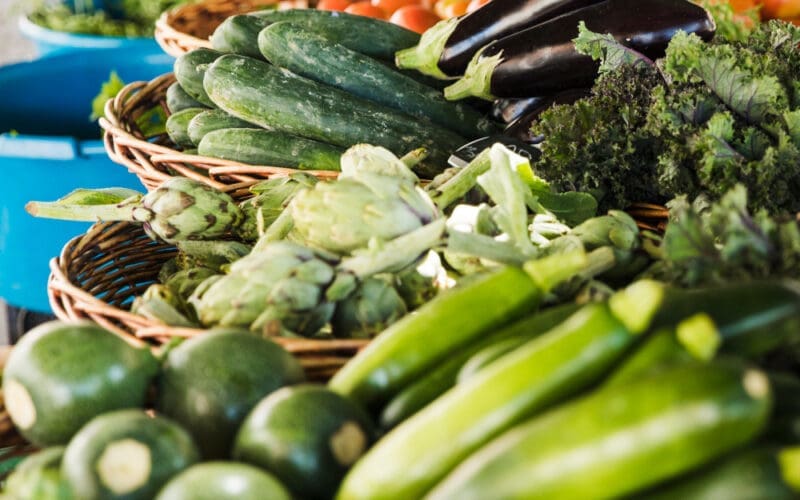 Arrangement of vegetable in wicker basket at market