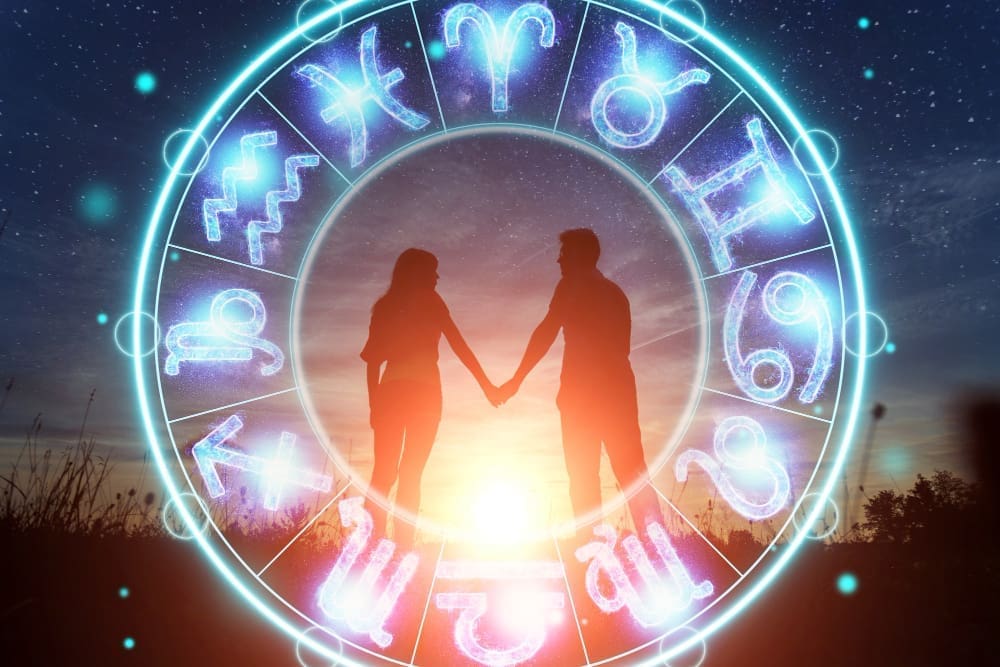Astrological theme featuring a couple, a man and a woman, set against a backdrop of a circle adorned with zodiac signs