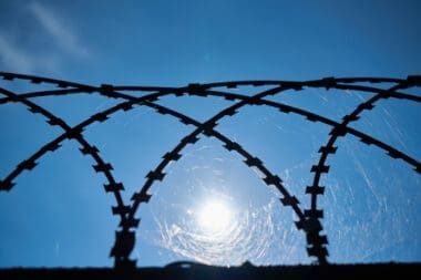 Barbed Wire on a Metal Grate