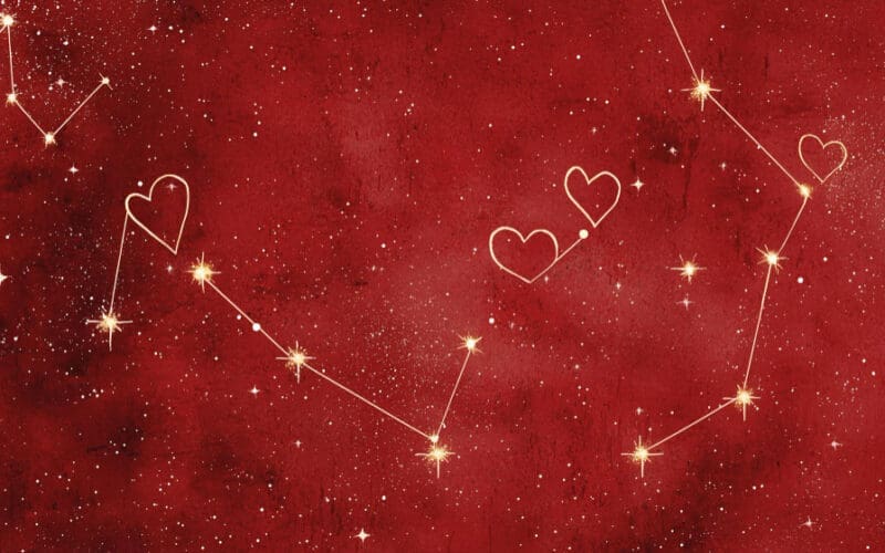 Cosmic red backdrop featuring heart-shaped constellations