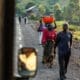 Democratic Republic of Congo - March 9, 2018. People walking along the road in Goma town in eastern Congo