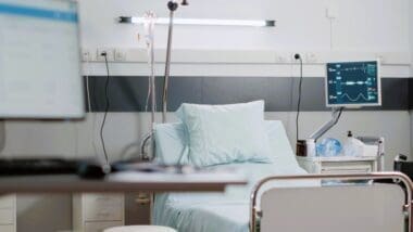 Empty emergency room with heart rate monitor