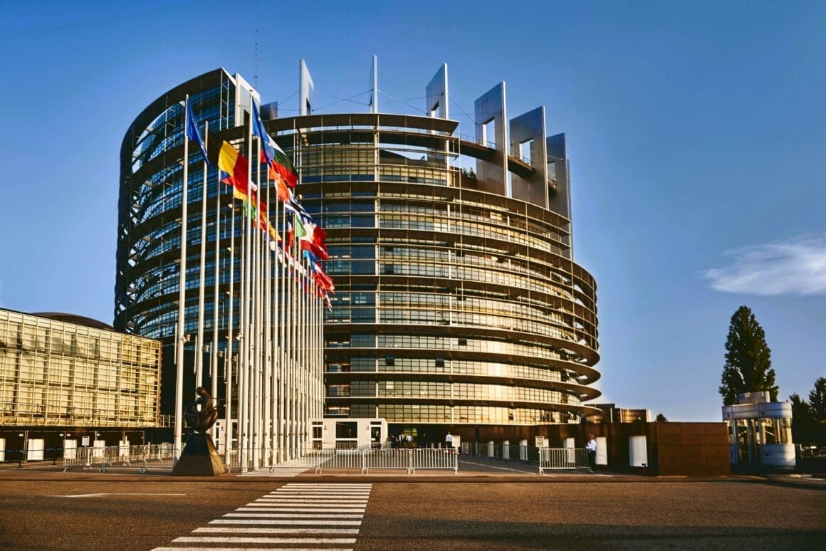 European Parliament building in Strasbourg, France, set against a clear blue sky