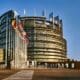 European Parliament building in Strasbourg, France, set against a clear blue sky