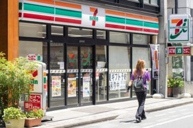 Front view of a 7-Eleven store in Shibuya, Tokyo. 7-Eleven, Inc. is a convenience store chain owned by Seven and I Holdings through Seven-Eleven Japan Co., Ltd