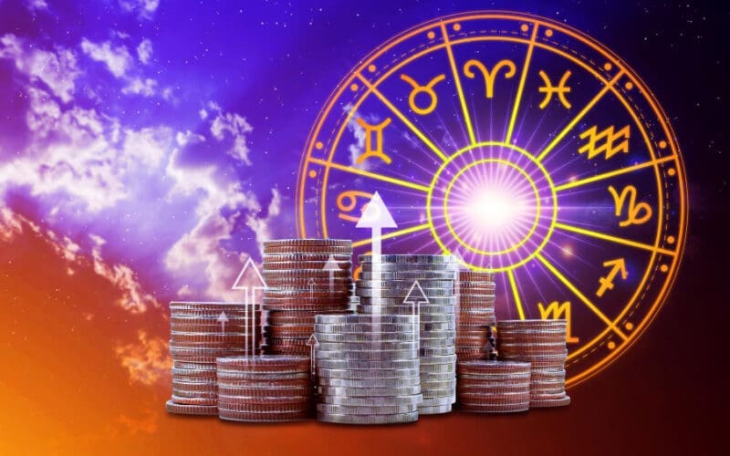 Horoscope featuring zodiac signs and coins, representing the concepts of astrology and wealth. This reflects the financial horoscope theme, combining astrology with financial prosperity