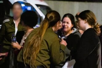 Hostages released to the IDF on 25 November. Photo by IDF Spokesperson's Unit, CC BY-SA 3.0, via Wikimedia Commons