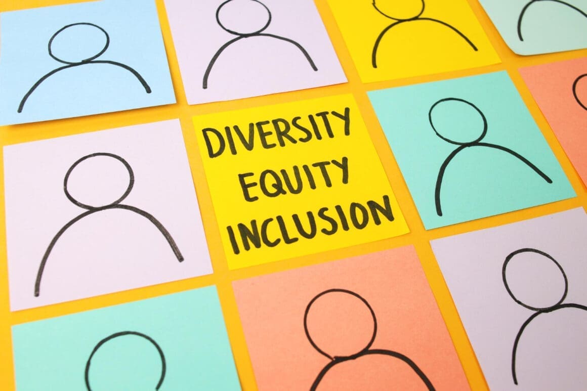 Illustration of the DEI (Diversity, Equity, Inclusion) symbol crafted from vibrant, colorful papers