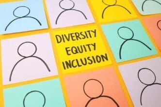 Illustration of the DEI (Diversity, Equity, Inclusion) symbol crafted from vibrant, colorful papers