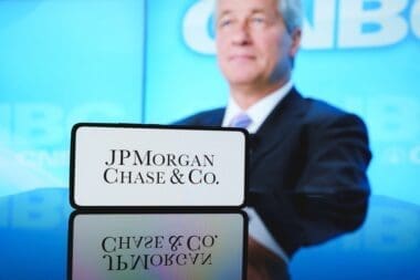 JPMorgan Chase logo in front of company CEO Jamie Dimon. December 6, 2024