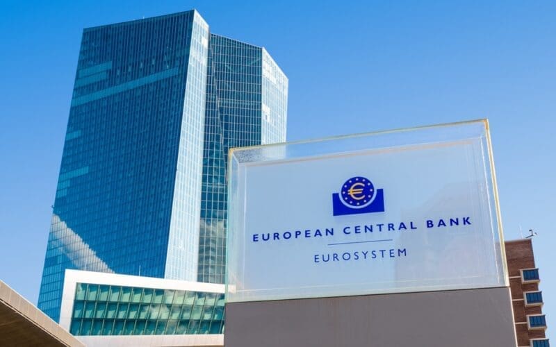 Low angle view of the sign and logo of the European Central Bank at the northern entrance of the Skytower building, headquarters of the ECB since 2015