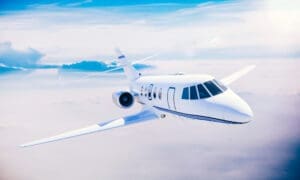 Luxury private jet soaring through the sky