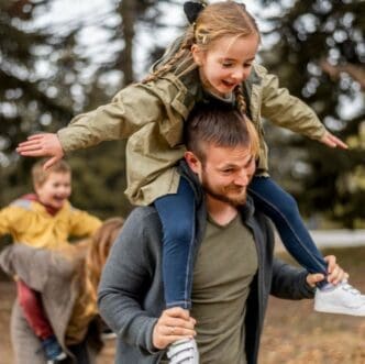 Medium shot parents and kids having fun