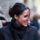 Meghan Markle arrives at a blustery Cardiff Castle