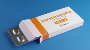 Mifepristone tablets in box. RU-486 Medical abortion pills. Used in combination with misoprostol 3D rendering