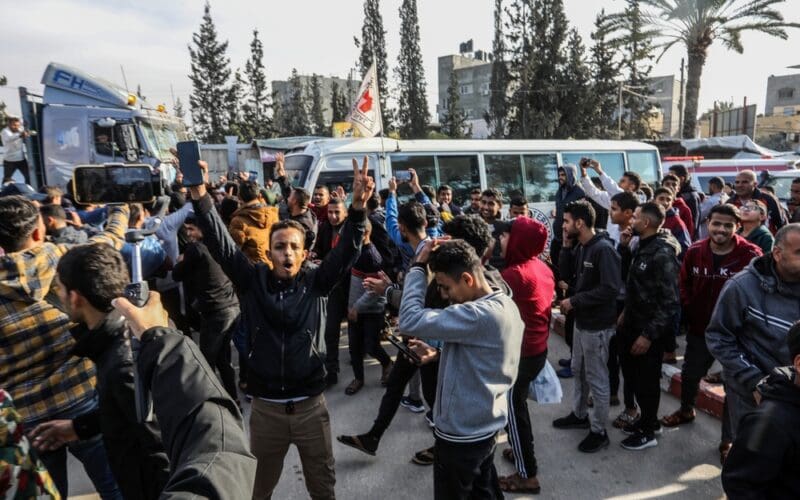 Palestinians receive prisoners released from the occupation prisons in coordination with the Red Cross, arriving in the Gaza, in the southern Gaza Strip, on January 25, 2025