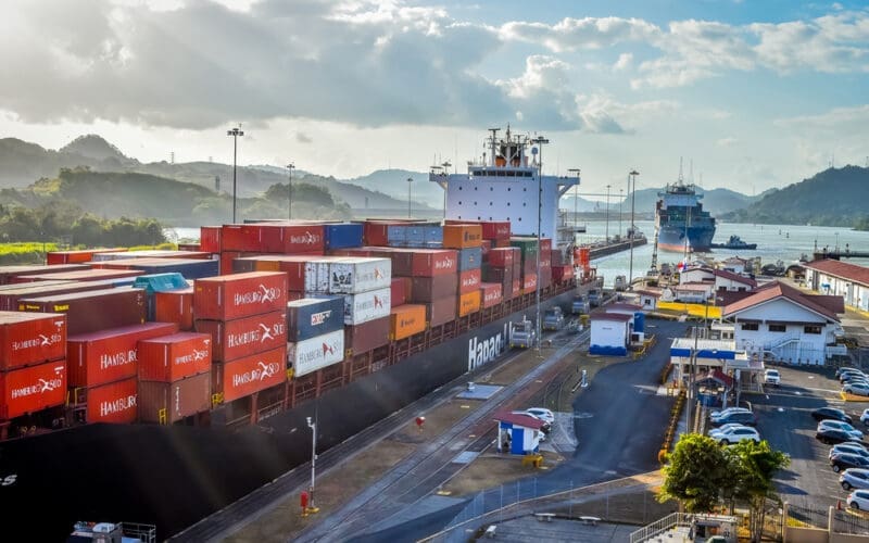 Panama Canal, Panama -March 27, 2018 Cargo ship in Miraflores Locks Panama Canal