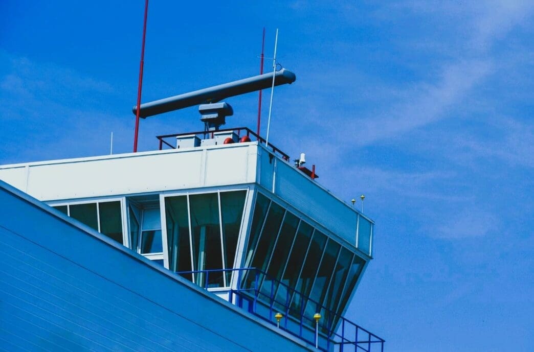 Radar station positioned above the traffic control tower