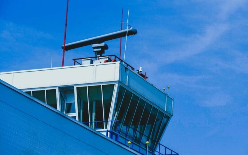 Radar station positioned above the traffic control tower