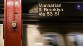 Sign for the underground metropolitan platform at a New York subway station