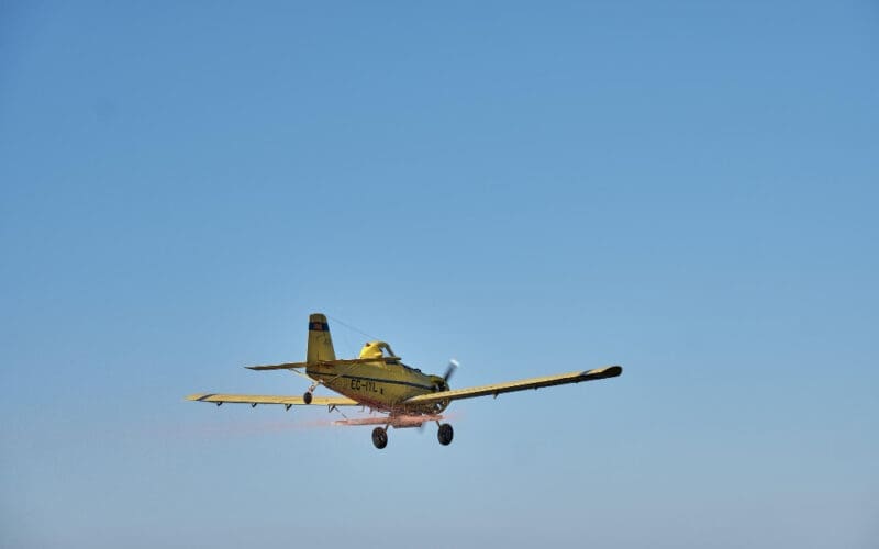 Single-engine propeller airplane flying