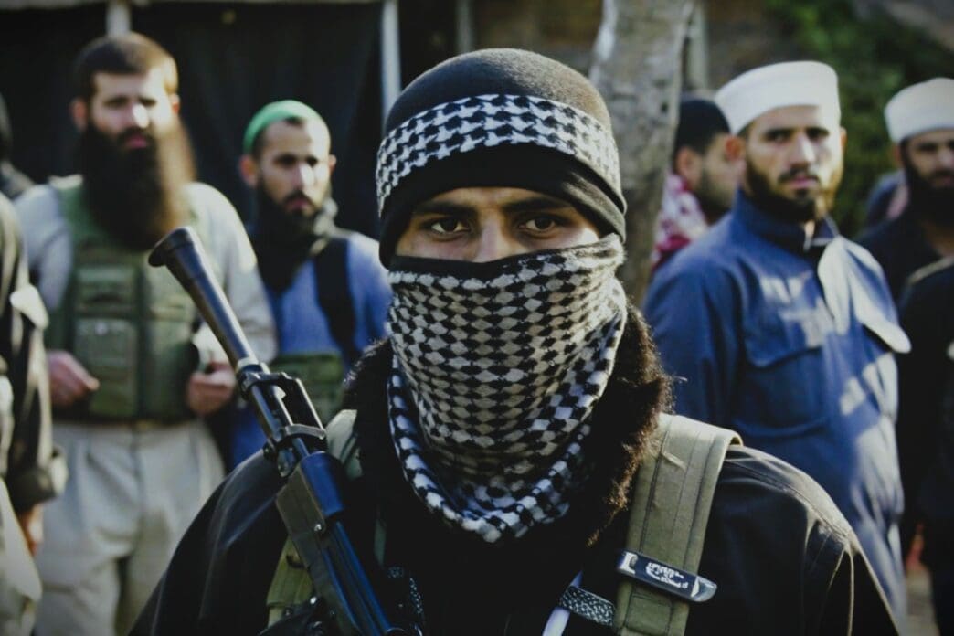 Taliban carrying a gun