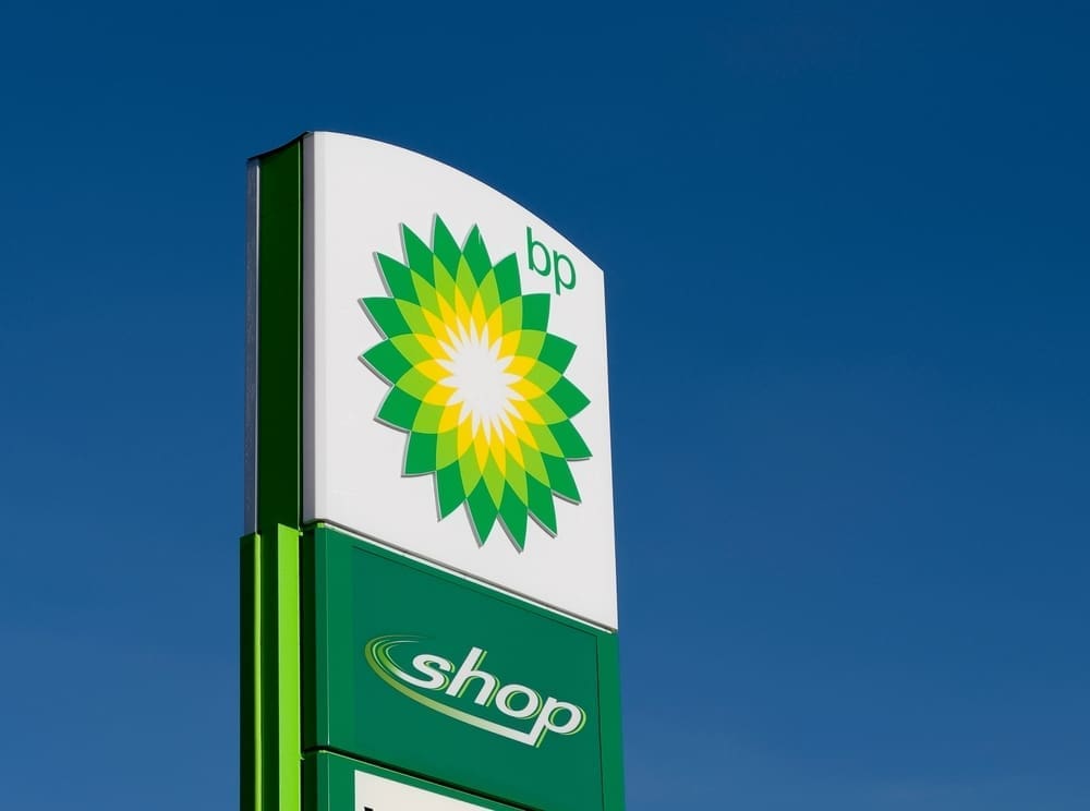 Tall sign at the entrance to a petrol station operated by BP