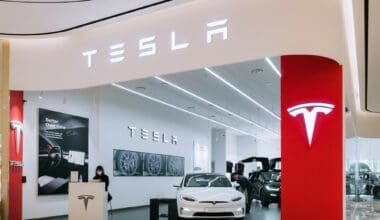 Tesla car showroom Logo sign Automotive electric vehicle company TSLA designs and manufacture