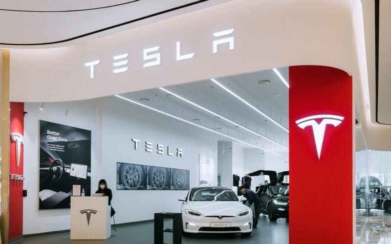 Tesla car showroom Logo sign Automotive electric vehicle company TSLA designs and manufacture