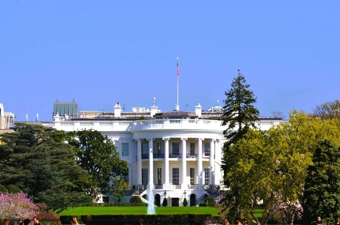 The White House featuring the U.S. flag atop it