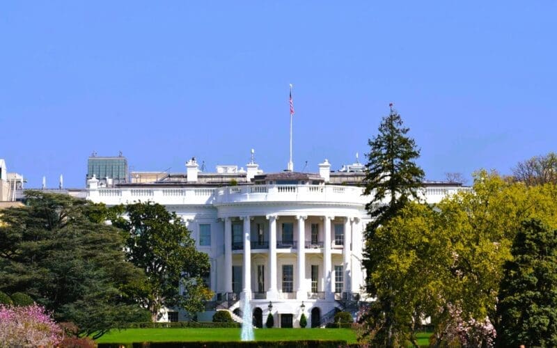 The White House featuring the U.S. flag atop it