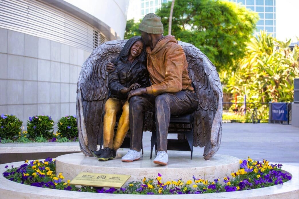 The newly statue of late Los Angeles Lakers star Kobe Bryant and his daughter, Gigi Bryant, is unveiled outside Crypto.com Arena August. 3, 2024, in Los Angeles